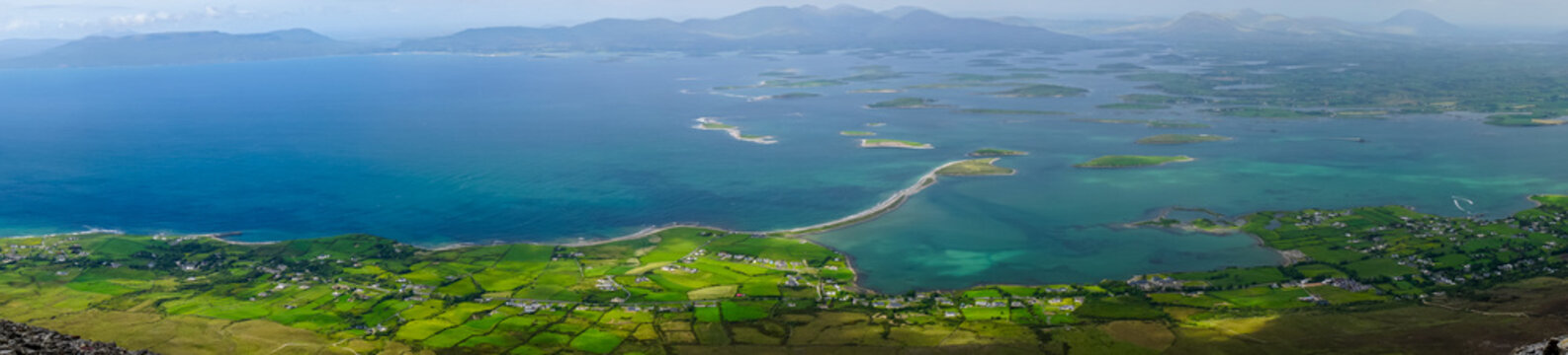 Panoramic, scenic sea and mountain landscape with islands. View from Croagh Patrick -  important site of pilgrimage in County Mayo, Ireland