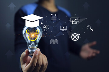 Man holding smile light bulb represent to education tutoring or e-learning on internet and get...
