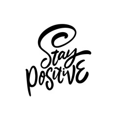Stay positive black color lettering phrase.