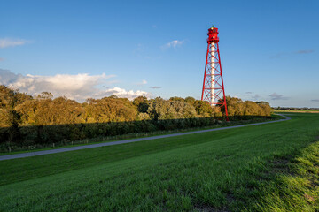 Campen lighthouse in East Frisia, Germany. At a height of 213 feet (65 m) it is the tallest...