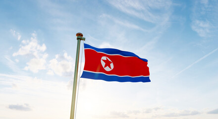 Flag of North Korea waving in the wind, sky and sun background. North Korea Flag. Ultra Hd.