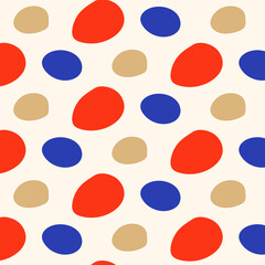 Seamless pattern with colorful polka dots on beige background