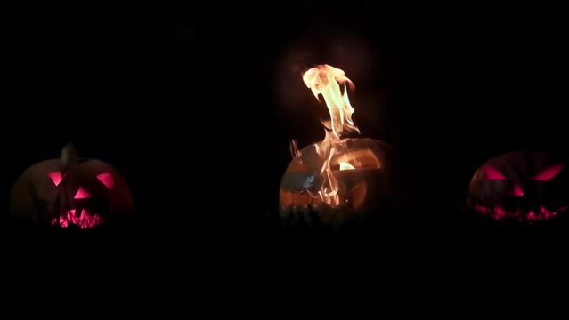 silhouette of a monster in the smoke, Grim Reaper, Halloween monster, man with a scary pumpkin on his head, Halloween theme, Slow motion, horror