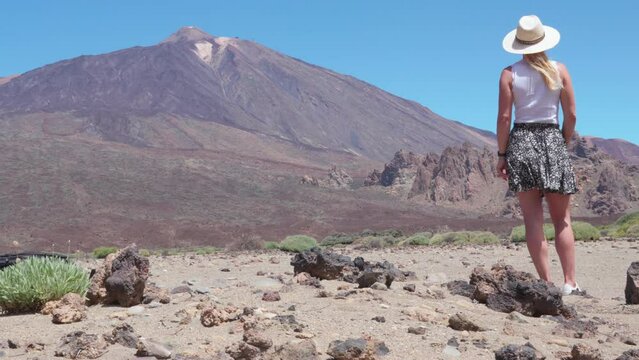 woman looking at the scenic view of Mount Teide. National park in Tenerife