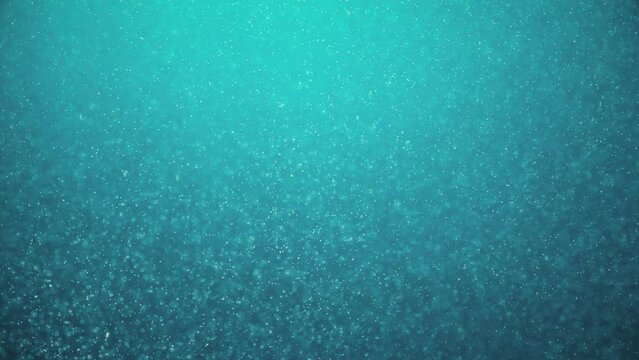 Amazing underwater scene with floating particles and plankton and light rays