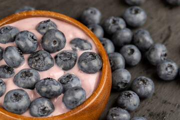 fresh blueberry-flavored yogurt with ripe blueberries