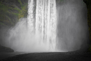 Skogafoss Waterfall in front of the falls in Iceland