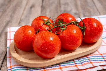 Bunch of ripe red tomatoes
