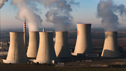 aerial view of coal fired power station and Combined cycle power plant at sunrise, Pocerady, Czech...