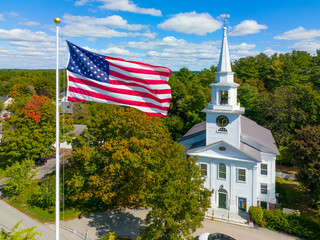 First Religious Society church aerial view at 27 School Street and US National Flag at Town Common...