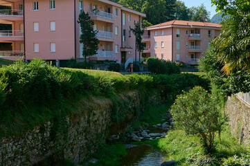 Fototapeta na wymiar Beautiful comfortable houses in Lombardy, in Italian Alps