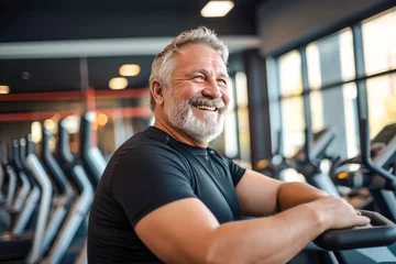 Papier Peint photo Fitness Full-figured caucasian middle-aged man exercising in gym