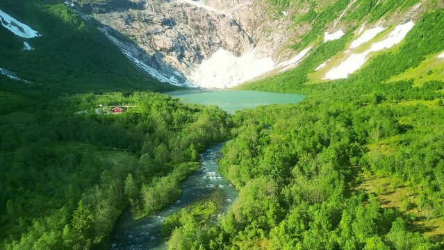 Drone Norway. Boyabreen Glacier melting. Jostedalsbreen National Park. Norwegian popular tourism destination. Concept of climate change, global warming, melting ice.  
