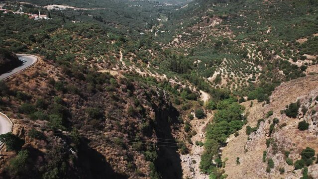 Beautiful bird's eye perspective over Topolia Gorge located in west Crete. Drone flying over Greek hills. High quality 4k footage