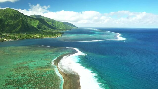 Drone Tahiti. tropical island lagoon, coastal mountains. Aerial view of French Polynesia. Teahupoo is a famous surfing destination near Papeete. Adventure travel. 