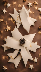 christmas decoration with stars and ribbons on brown background. top view