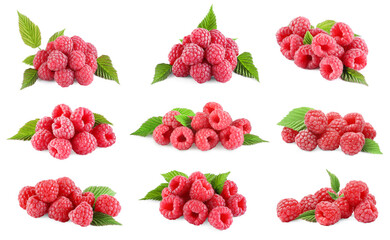 Set with fresh ripe raspberries and green leaves isolated on white