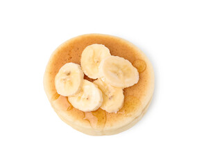 Delicious pancake with banana slices and honey isolated on white, top view