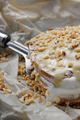 Cinnabon bun with cinnamon, pistachio cream, and pistachios