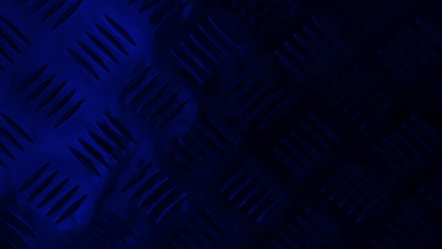 Blue Flashing Light On Metal Grip Floor
