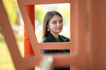 Portrait of a young beautiful girl in an urban environment.