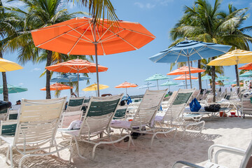 Colorful bright sunny day on the white sand beach and turquoise colored water on a Caribbean...