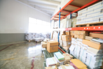 Warehouse business industry blurred background with box on shelf
