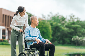 Asian people elderly man on wheelchair with caregiver nurse outdoor, , exemplifying the essence of holistic well-being and compassionate support. Nature Therapy - obrazy, fototapety, plakaty