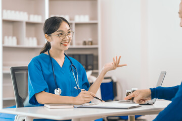 Asian people experienced female doctor giving advice to elderly male patient cancer and x-ray results and treatment options, Cancer Consultation, Elderly Man Receives Expert Cancer Advice Awareness