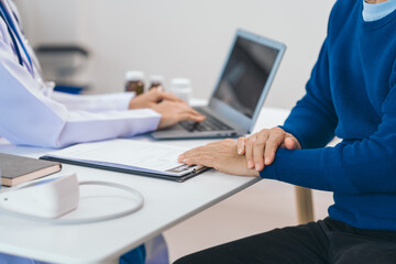 Asian people experienced female doctor giving advice to elderly male patient cancer and x-ray results and treatment options, Cancer Consultation, Elderly Man Receives Expert Cancer Advice Awareness