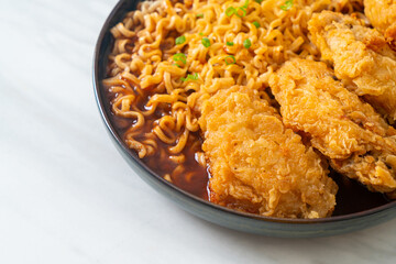 Korean instant noodles with fried chicken or Fried chicken ramyeon