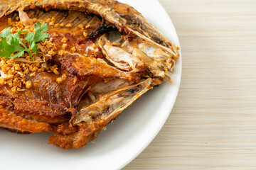 Fried Sea Bass Fish with Garlic