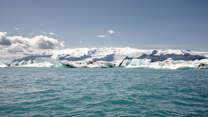 kayaking in Iceland next to an iceberg