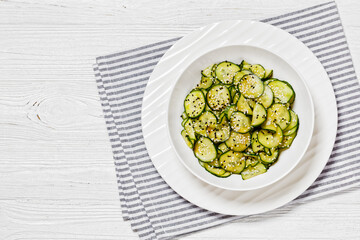 Sunomono, Japanese Cucumber Salad in a white bowl