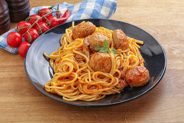 Spaghetti with meatball in tomato sause