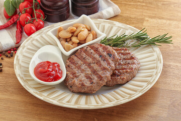 Grilled beef burger cutlet with sauce