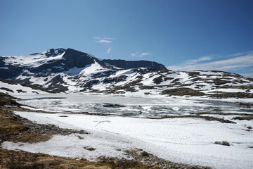 Fototapeta na wymiar Mountains in the Jotunheimen National Park. Along the National tourist scenic route 55 Sognefjellet. Norway