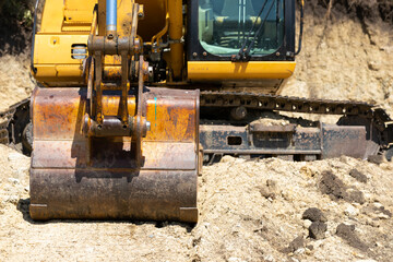Fototapeta na wymiar Excavator on the construction site