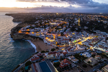 Evening at Carvoeiro popular tourist town in Algarve , Portugal. Aerial drone view