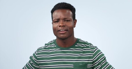Hands, yawn and face of tired man in studio with burnout, low energy or exhausted on blue background. Fatigue, portrait and African male model with yawning emoji for sleepy, lazy or bored gesture - Powered by Adobe