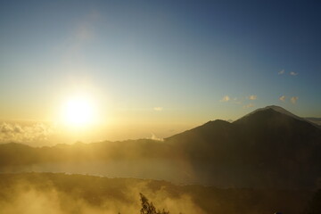 Naklejka premium sunrise on mount batur indonesia volcano, vulcanic sunrise