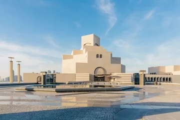 Fotobehang Museum of islamic art in Doha, Qatar, sunny day with clear blue sky © Marina Popova