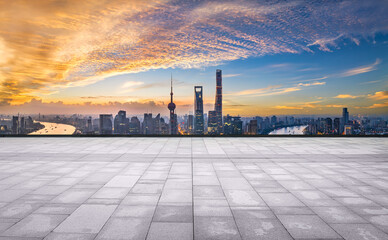 Shanghai city skyline and square floor in the morning