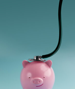Financial Checkup, Review Concept. Meeting with a Financial Expert,Examination of Valuable Financial Assets, Money, Cost, Debts, Retirement Contributions. a Pink Piggy Bank with Stethoscope