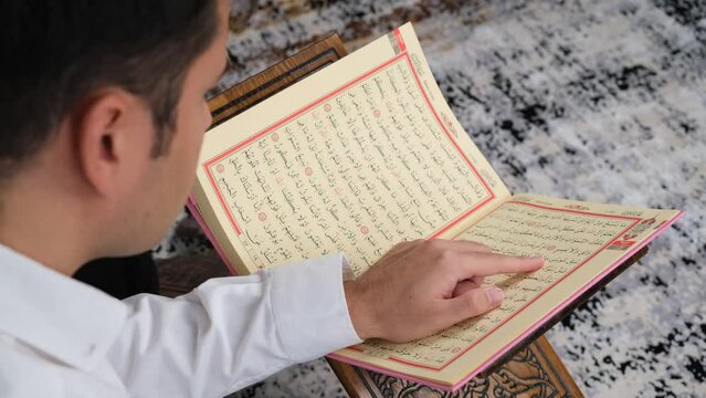 Muslim reading Quran