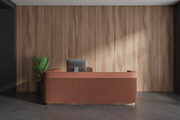 Stylish office reception interior brown desk with pc computer and decoration
