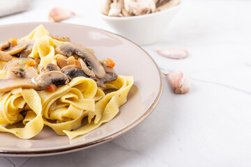 Fettuccine With Mushrooms. Typical dish of the Italian tradition, suitable for those who follow a vegetarian diet.