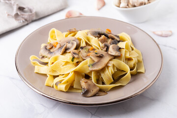 Fettuccine With Mushrooms. Typical dish of the Italian tradition, suitable for those who follow a...