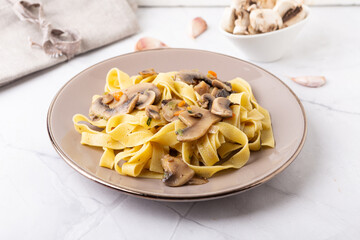 Fettuccine With Mushrooms. Typical dish of the Italian tradition, suitable for those who follow a vegetarian diet.
