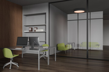 Gray and wooden office workplace with lounge area
